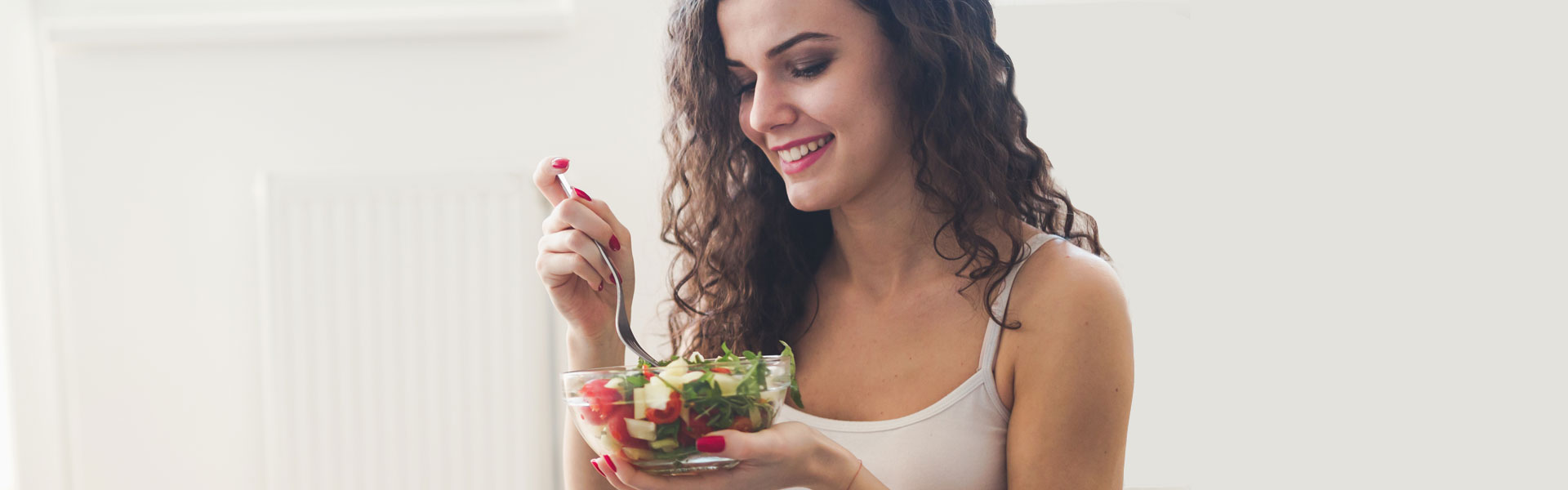 Woman Eating Salad